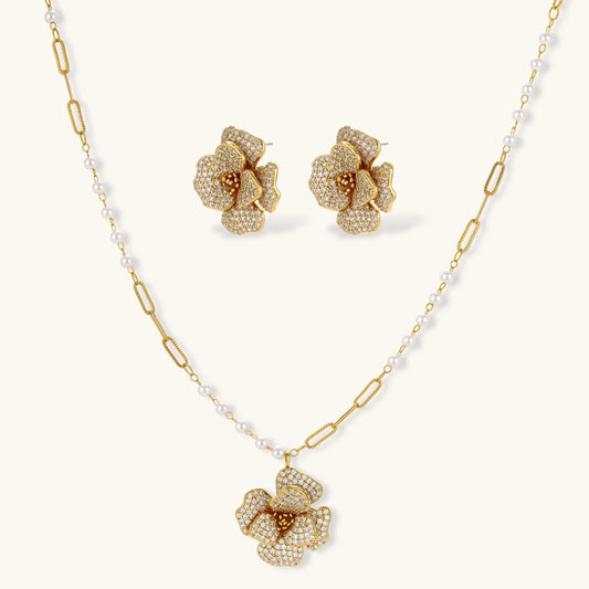 14K gold-plated flower jewelry set with zirconia crystals, featuring dimensional petal necklace and matching earrings