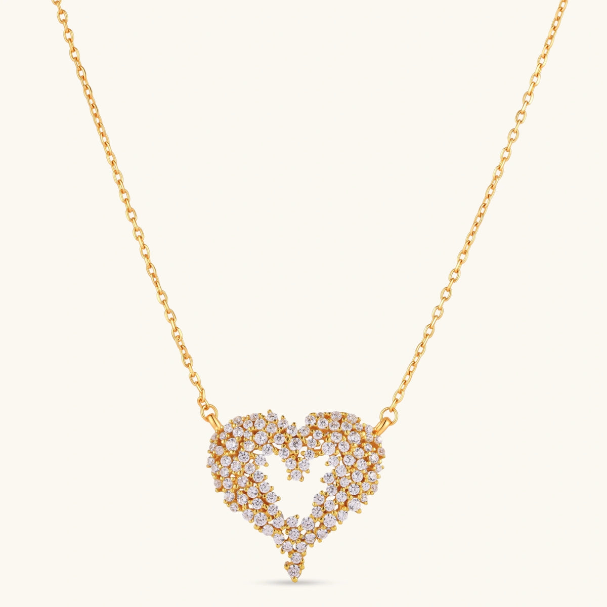 18K gold-plated 925 silver open heart pendant necklace with scattered cubic zirconia stones on a fine cable chain.